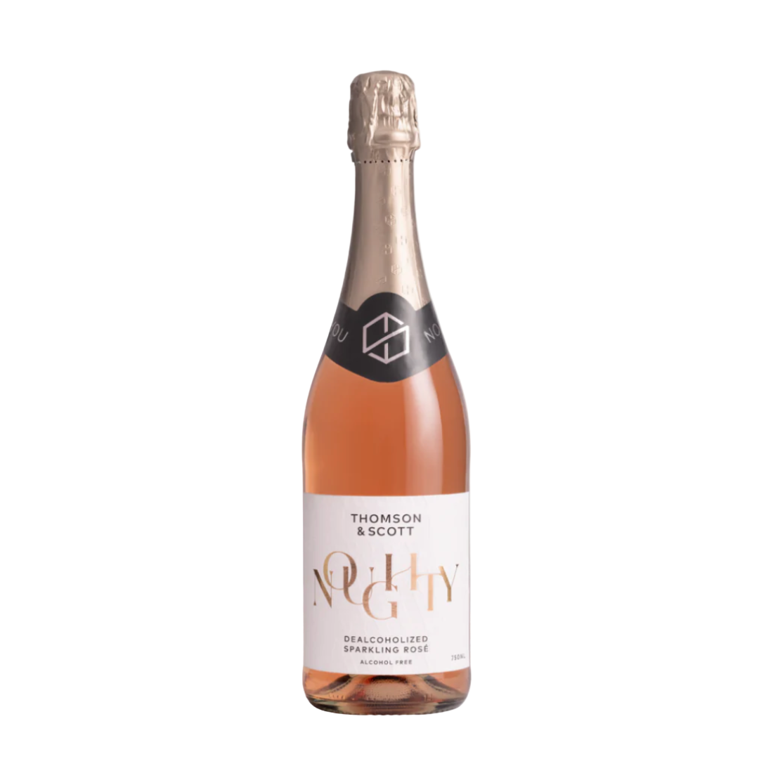 A bottle of Noughty Nonalcoholic Sparkling Rosé wine with a visible label and cork on a wooden surface.