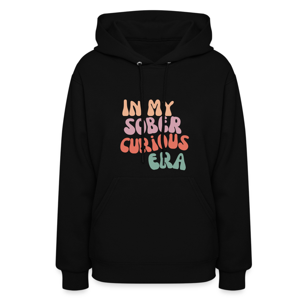 Black hoodie with colorful text 'IN MY SOBER CURIOUS ERA' on a white background